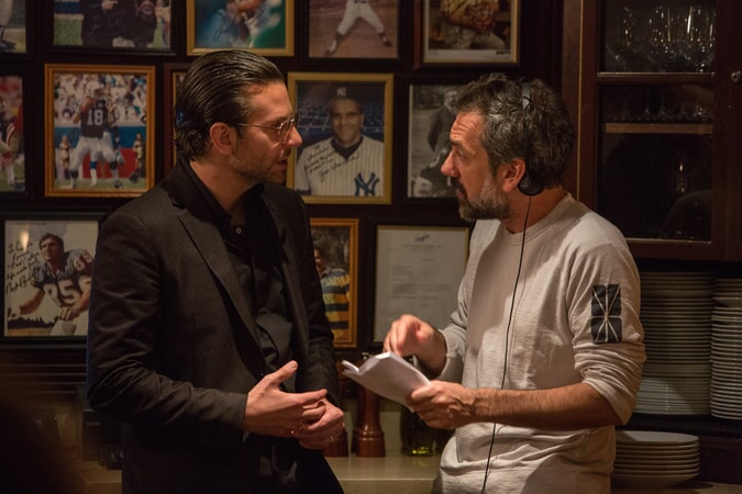 Actor/producer BRADLEY COOPER and director/writer/producer TODD PHILLIPS on the set of Warner Bros. Pictures' comedic drama (based on true events) "WAR DOGS," a Warner Bros. Pictures release.