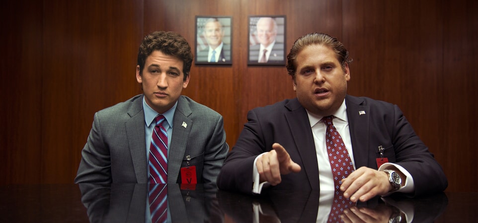 MILES TELLER as David and JONAH HILL as Efraim in suits