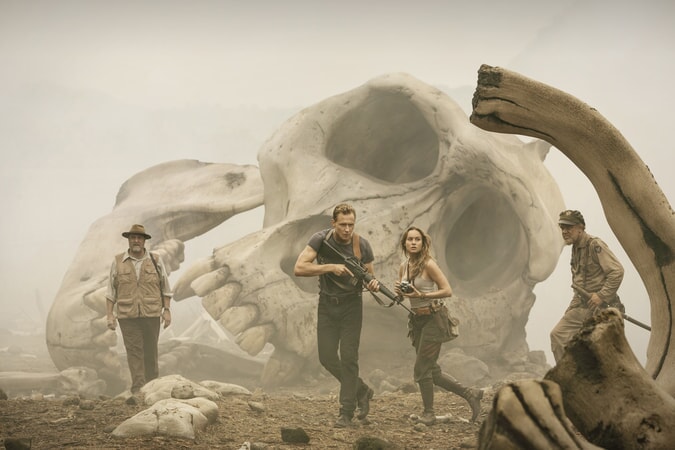 JOHN GOODMAN as Randa, TOM HIDDLESTON as Conrad, BRIE LARSON as Mason and JOHN C. REILLY as Marlow in Warner Bros. Pictures' and Legendary Pictures' action adventure "KONG: SKULL ISLAND," a Warner Bros. Pictures release.