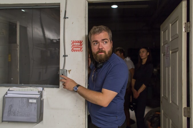 Director DAVID F. SANDBERG on the set