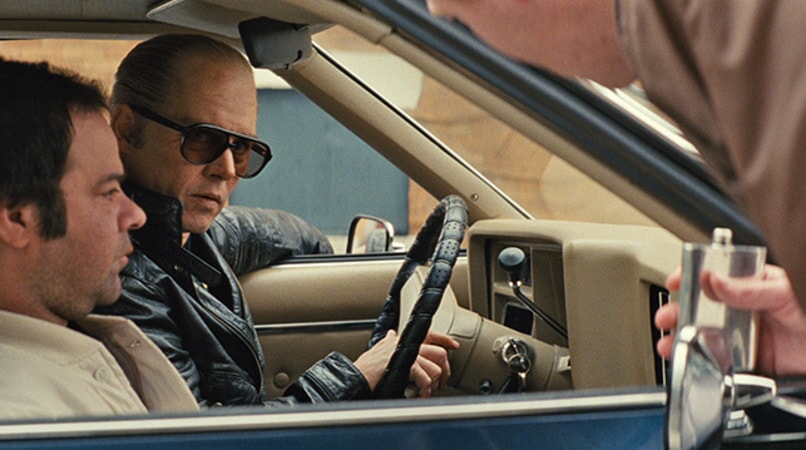 RORY COCHRANE as Stephen Flemmi and JOHNNY DEPP as Whitey Bulger in the drama "BLACK MASS." 