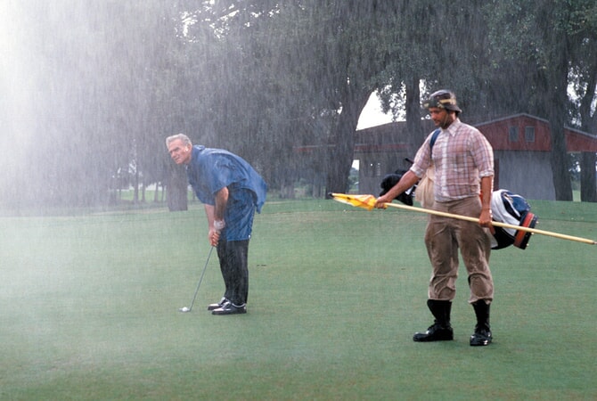 henry wilcoxin as the bishop and bill murray as carl spackler in caddyshack