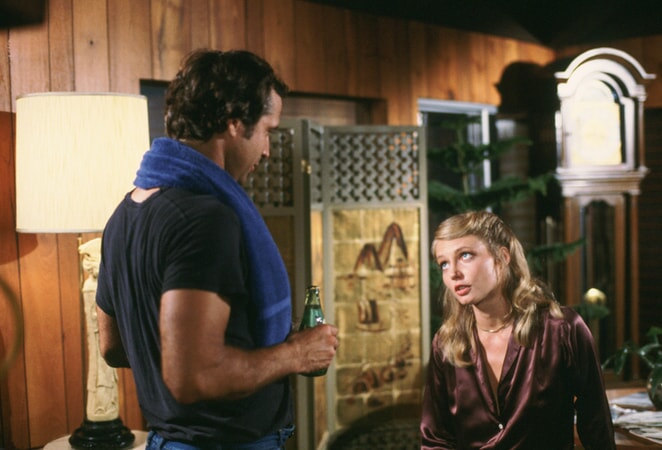 chevy chase as ty webb and cindy morgan as lacey underall in caddyshack