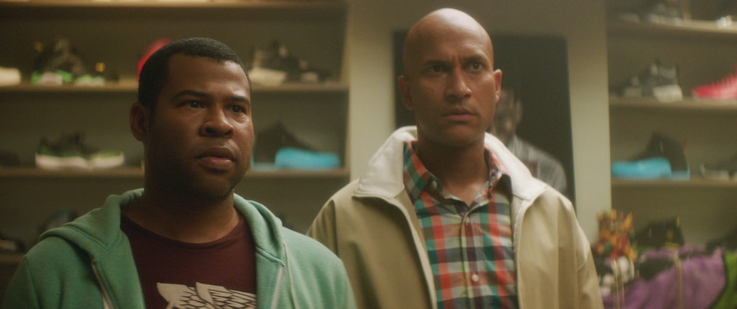 JORDAN PEELE as Rell and KEEGAN-MICHAEL KEY as Clarence looking perplexed