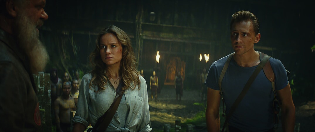 BRIE LARSON as Mason Weaver and TOM HIDDLESTON as James Conrad in Warner Bros. Pictures', Legendary Pictures' and Tencent Pictures' action adventure "KONG: SKULL ISLAND," a Warner Bros. Pictures release.