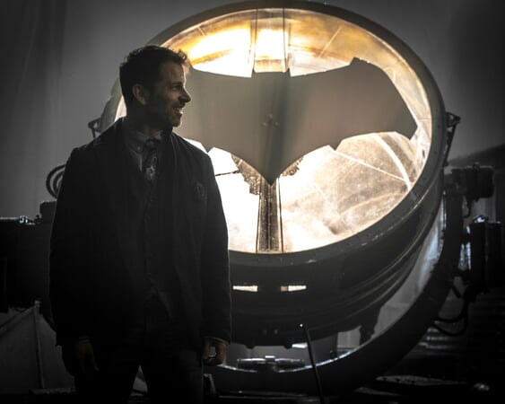 Director Zack Snyder in front of Bat Signal