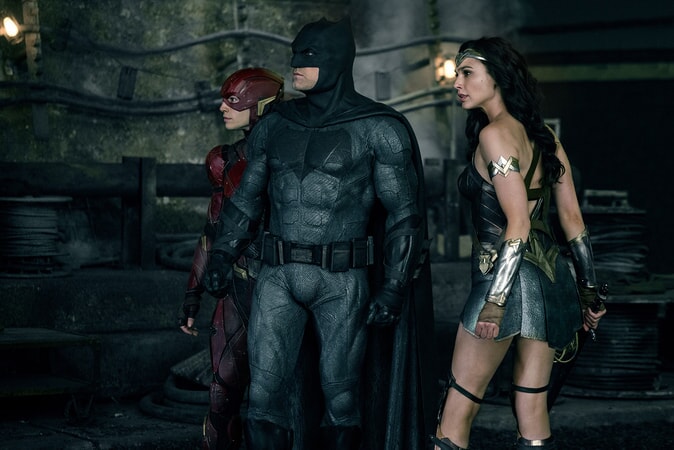 EZRA MILLER as The Flash, BEN AFFLECK as Batman and GAL GADOT as Wonder Woman in Warner Bros. Pictures' action adventure "JUSTICE LEAGUE," a Warner Bros. Pictures release.