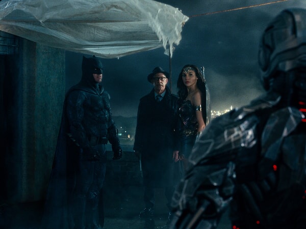 BEN AFFLECK as Batman, J.K. SIMMONS as Commissioner Gordon, GAL GADOT as Wonder Woman and RAY FISHER as Cyborg in Warner Bros. Pictures' action adventure "JUSTICE LEAGUE," a Warner Bros. Pictures release.