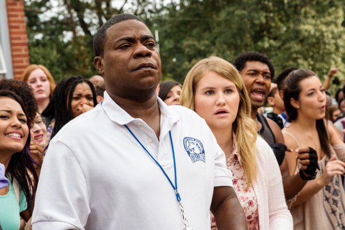 TRACY MORGAN as Coach Crawford and JILLIAN BELL as Holly in the New Line Cinema and Village Roadshow Pictures comedy "FIST FIGHT," a Warner Bros. Pictures release.