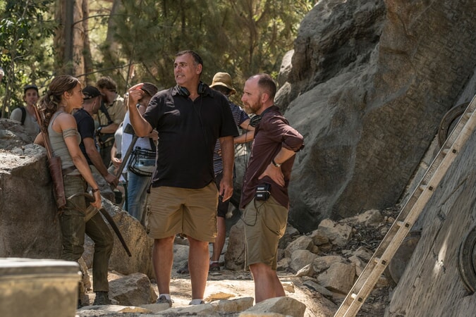 (L-R) ALICIA VIKANDER, producer GRAHAM KING and director ROAR UTHAUG on the set of Warner Bros. Pictures' and Metro-Goldwyn-Mayer Pictures' action adventure "TOMB RAIDER," a Warner Bros. Pictures release.