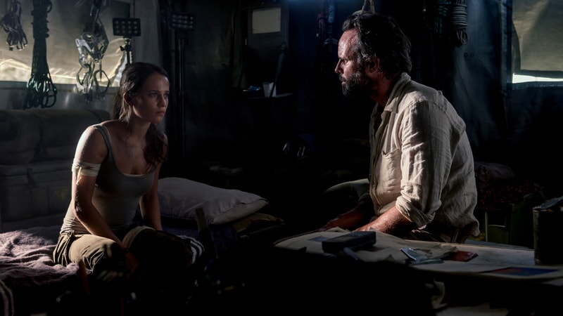 (L-R) ALICIA VIKANDER as Lara Croft and WALTON GOGGINS as Mathias Vogel in Warner Bros. Pictures' and Metro-Goldwyn-Mayer Pictures' action adventure "TOMB RAIDER," a Warner Bros. Pictures release.