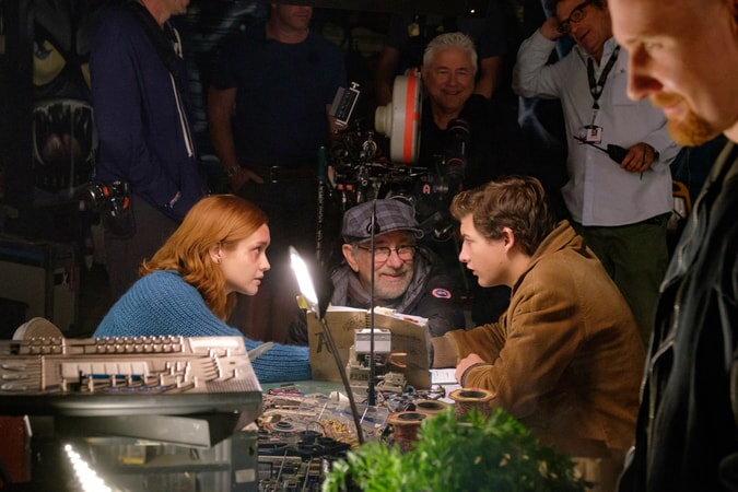 (Center L-R) OLIVIA COOKE, director/producer STEVEN SPIELBERG and TYE SHERIDAN on the set of Warner Bros. Pictures', Amblin Entertainment's and Village Roadshow Pictures' action adventure "READY PLAYER ONE," a Warner Bros. Pictures release.