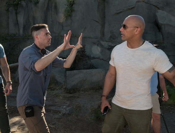 (L-R) Director/producer BRAD PEYTON and DWAYNE JOHNSON on the set of New Line Cinema's and ASAP Entertainment's action adventure "RAMPAGE," a Warner Bros. Pictures release.