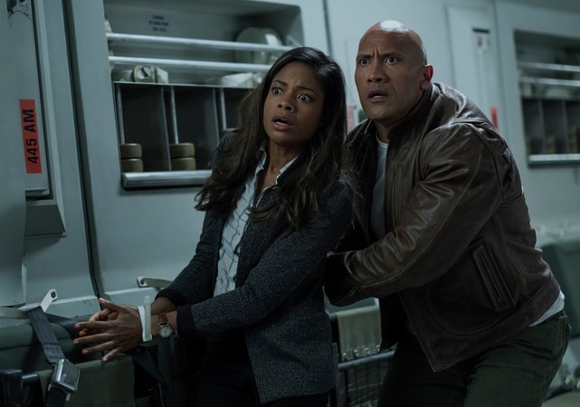 NAOMIE HARRIS as Dr. Kate Caldwell and DWAYNE JOHNSON as Davis Okoye in New Line Cinema's and ASAP Entertainment's action adventure "RAMPAGE," a Warner Bros. Pictures release.