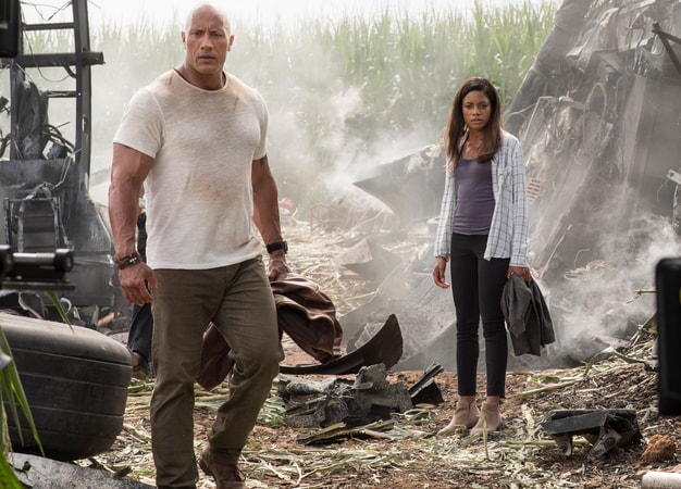 DWAYNE JOHNSON as Davis Okoye and NAOMIE HARRIS as Dr. Kate Caldwell in New Line Cinema's action adventure "RAMPAGE," a Warner Bros. Pictures' release.