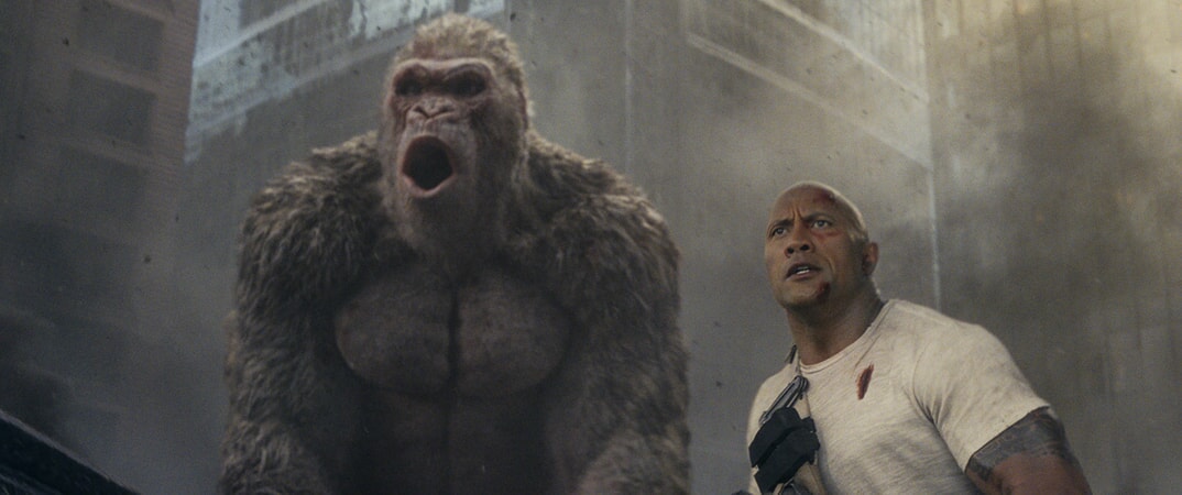 (L-R) JASON LILES as George and DWAYNE JOHNSON as Davis Okoye in New Line Cinema's and ASAP Entertainment's action adventure "RAMPAGE," a Warner Bros. Pictures release.