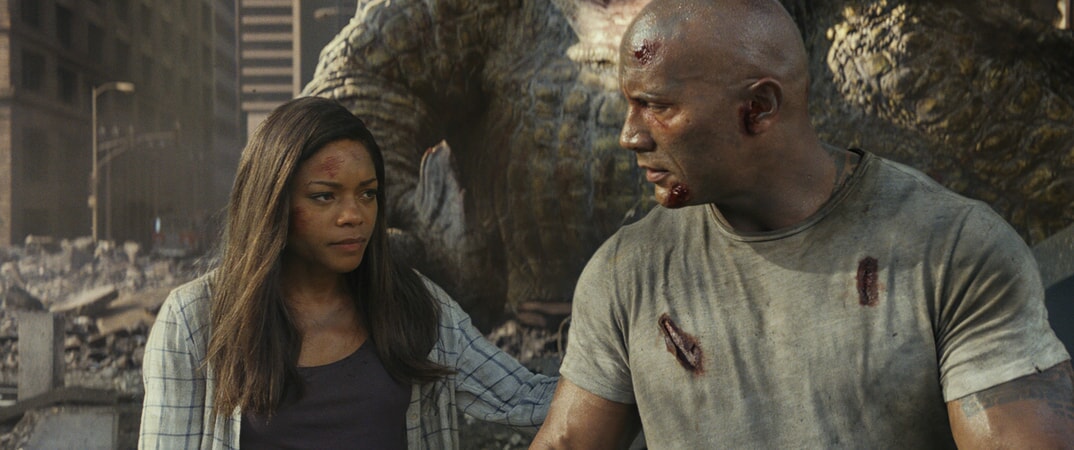 (L-R) NAOMIE HARRIS as Dr. Kate Caldwell and DWAYNE JOHNSON as Davis Okoye in New Line Cinema's and ASAP Entertainment's action adventure "RAMPAGE," a Warner Bros. Pictures release.