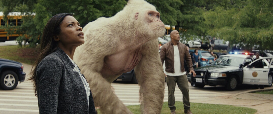 (L-R) NAOMIE HARRIS as Dr. Kate Caldwell, JASON LILES as George and DWAYNE JOHNSON as Davis Okoye in New Line Cinema's and ASAP Entertainment's action adventure "RAMPAGE," a Warner Bros. Pictures release.