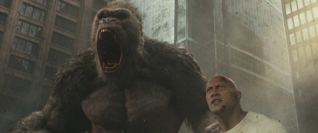 (L-R) JASON LILES as George and DWAYNE JOHNSON as Davis Okoye in New Line Cinema's and ASAP Entertainment's action adventure "RAMPAGE," a Warner Bros. Pictures release.
