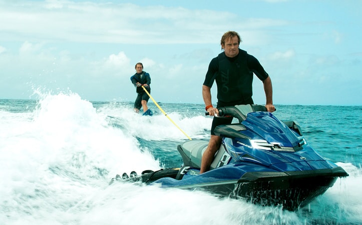LUKE BRACEY as Utah and LAIRD HAMILTON as Surf Vagabond in Alcon Entertainment's action thriller "POINT BREAK," a Warner Bros. Pictures release.