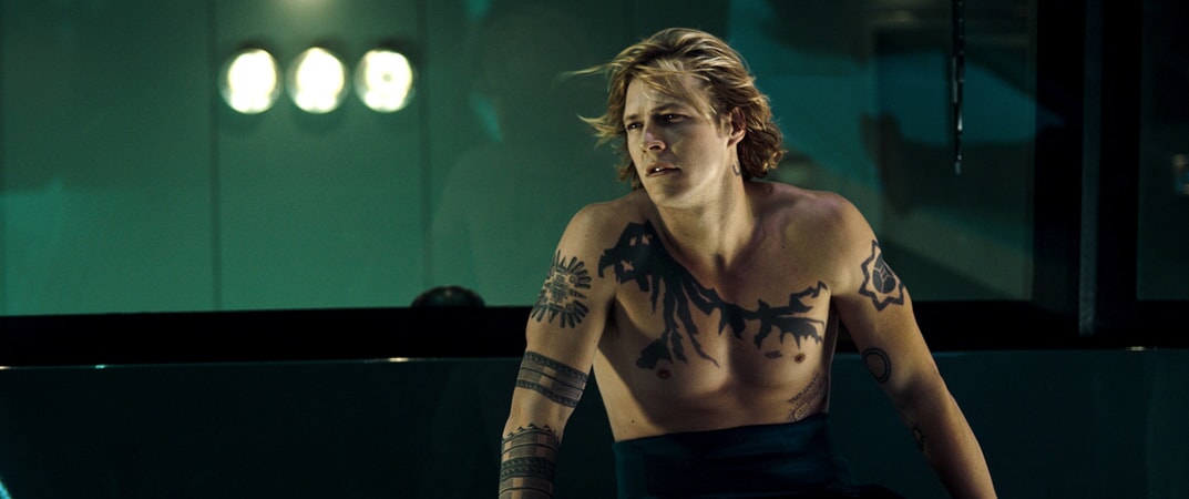 LUKE BRACEY as Utah in Alcon Entertainment's action thriller "POINT BREAK," a Warner Bros. Pictures release.
