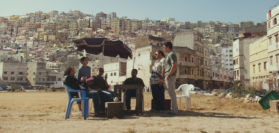 MANSOUR BADRI as Jordinian fixer, MOSA OMARI as Jordinian boy, MOHAMMED OMARI as Jordinian fixer, MILES TELLER as David and JONAH HILL as Efraim in Warner Bros. Pictures' comedic drama (based on true events) "WAR DOGS," a Warner Bros. Pictures release.