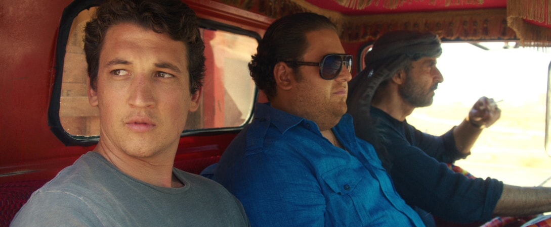 MILES TELLER as David, JONAH HILL as Efraim and SHAUN TOUB as Marlboro in Warner Bros. Pictures' comedic drama (based on true events) "WAR DOGS," a Warner Bros. Pictures release.
