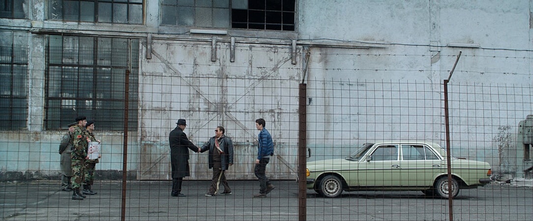 ANDREI FINTI as Yili Pinari, JONAH HILL as Efraim and MILES TELLER as David in Warner Bros. Pictures' comedic drama (based on true events) "WAR DOGS," a Warner Bros. Pictures release.