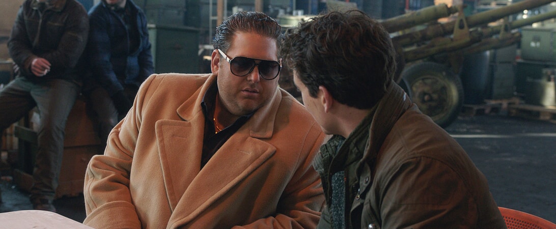 JONAH HILL as Efraim and MILES TELLER as David in Warner Bros. Pictures' comedic drama (based on true events) "WAR DOGS," a Warner Bros. Pictures release.